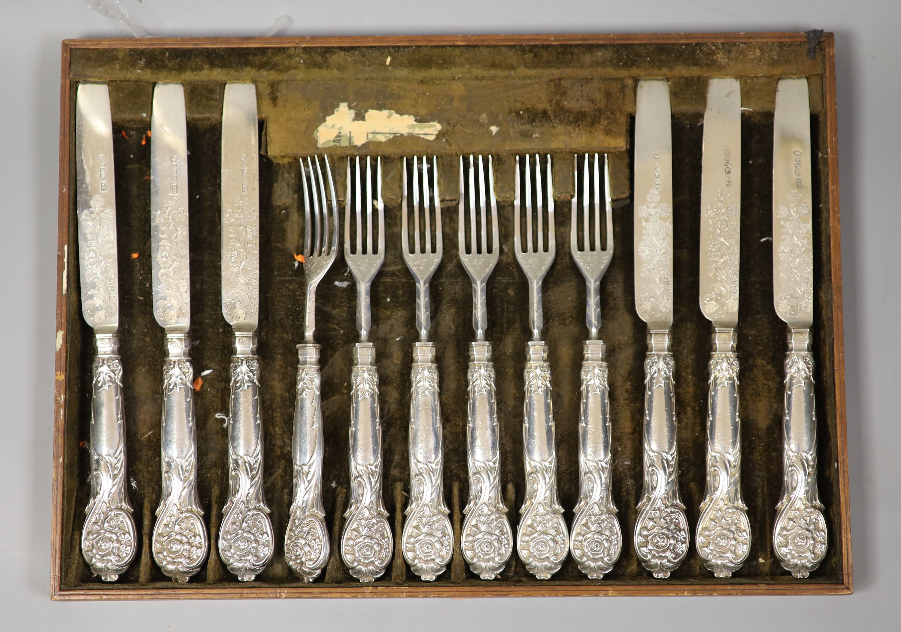 A set of six pairs of late William IV silver dessert eaters, Samuel Harwood, Sheffield, 1837, with loaded handles.